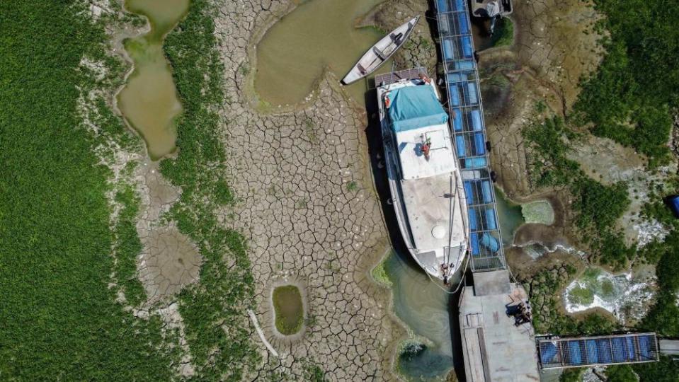 A photo taken last month with a drone shows the dry bed of the River Po between Parma and Reggio Emilia in Italy.