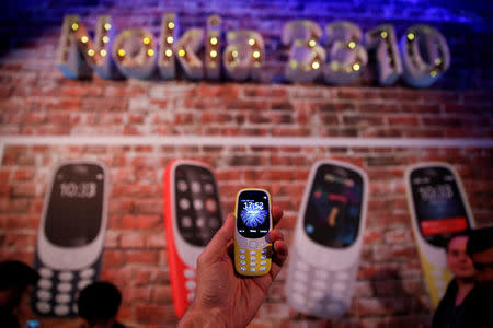 FILE PHOTO: A Nokia 3310 device is displayed after its presentation ceremony at Mobile World Congress in Barcelona, Spain, February 26, 2017. REUTERS/Paul Hanna/File Photo