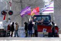 First Nations members of the Tyendinaga Mohawk Territory maintain a camp next to a railway crossing in Tyendinaga