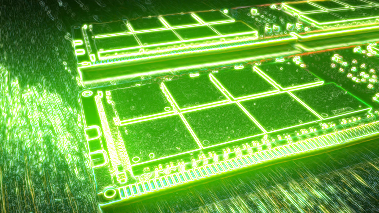  Close-up of two new computer RAM Memory module on a wooden table. 