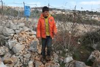 Hussein Chartouni, who claims that Israeli soldiers took the chicken he owned, is pictured at Mays Al-Jabal village