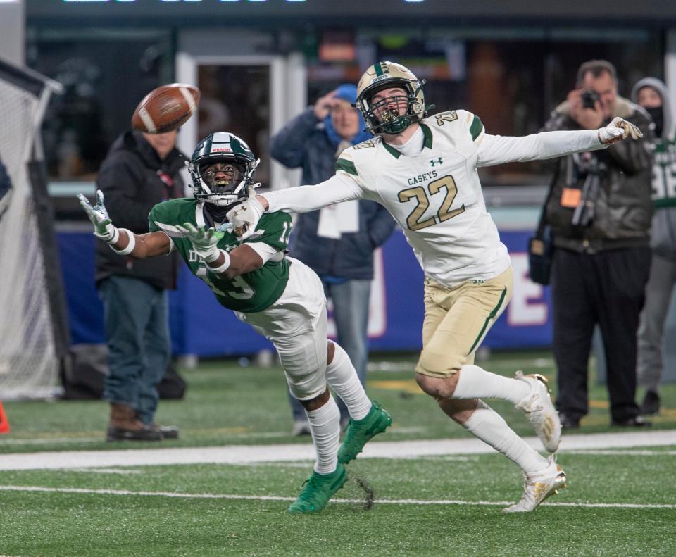 DePaul De'zie Jones strches out but can't pull in a long pass as Red Bank Joe Diorio triest to block it. DePaul High School vs Red Bank Catholic in NJSIAA Non-Public B Championship Game in East Rutherford on November 26, 2021. 