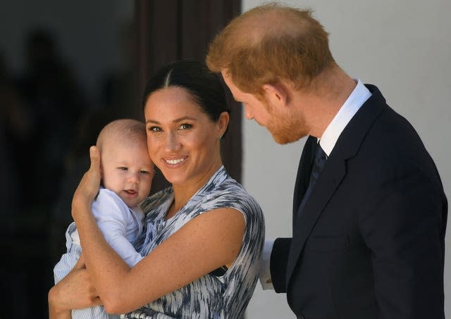 Harry with Archie and Meghan