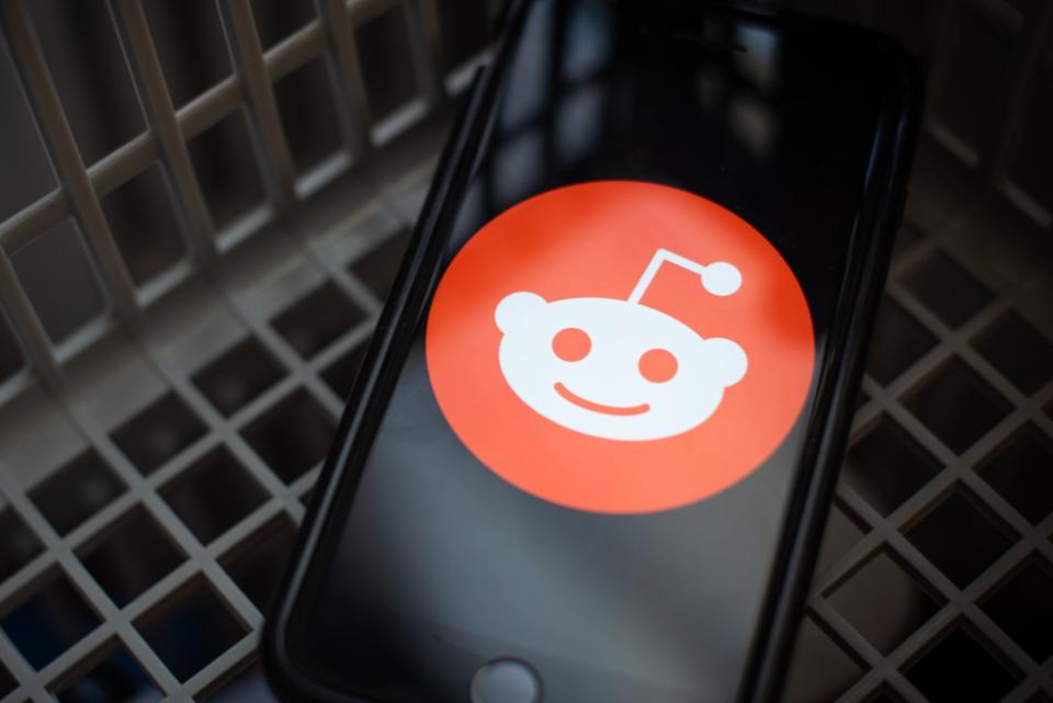 Reddit Inc. logo on a smartphone arranged in Hastings-On-Hudson, New York, U.S., on Friday, Jan. 29, 2021. 