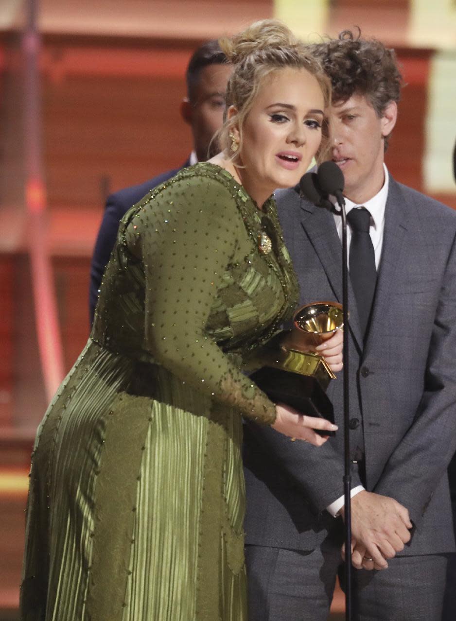 Adele accepts the award for record of the year for "Hello" at the 59th annual Grammy Awards on Sunday, Feb. 12, 2017, in Los Angeles. (Photo by Matt Sayles/Invision/AP)