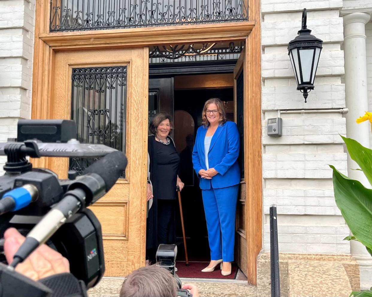 Progressive Conservative Leader Heather Stefanson, right, visits the office of Anita Neville, Manitoba's lieutenant-governor, marking the official start of the provincial election campaign on Tuesday. (Bartley Kives/CBC - image credit)