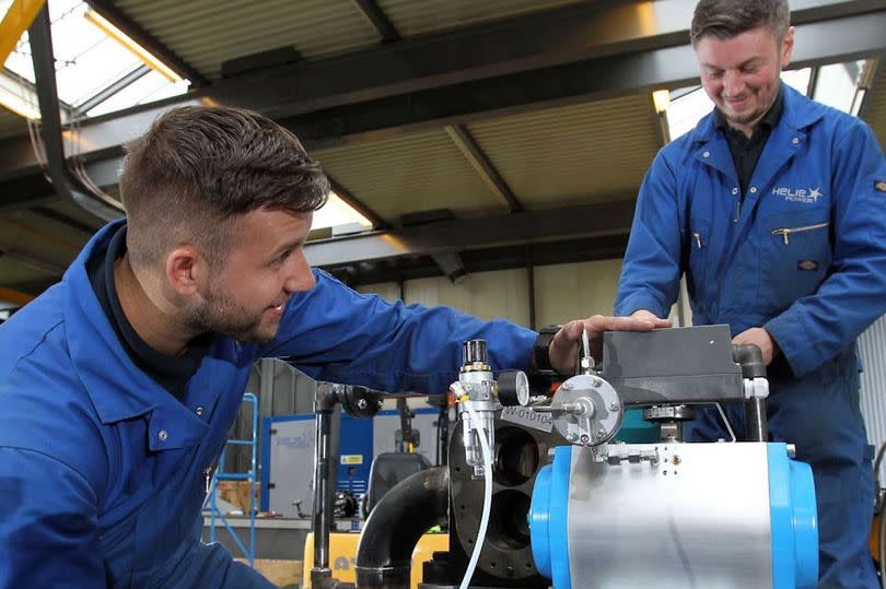 Staff working on the Heliex Power product in East Kilbride