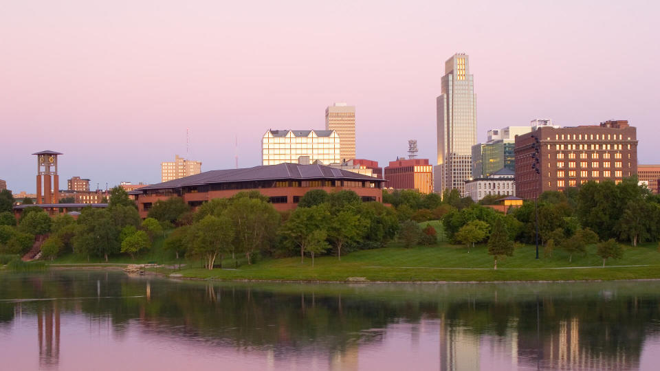 Lake in a park in downtown Omaha at dawn.