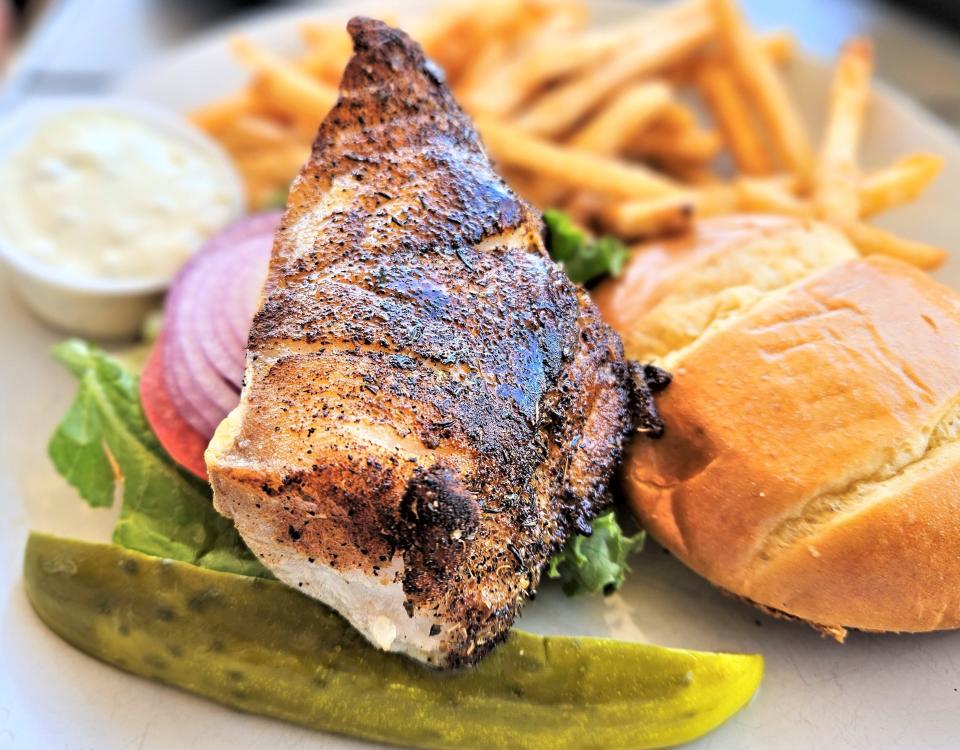 Blackened grouper sandwich at Hurricane Hanks in Holmes Beach on Anna Maria Island photographed June 4, 2023.