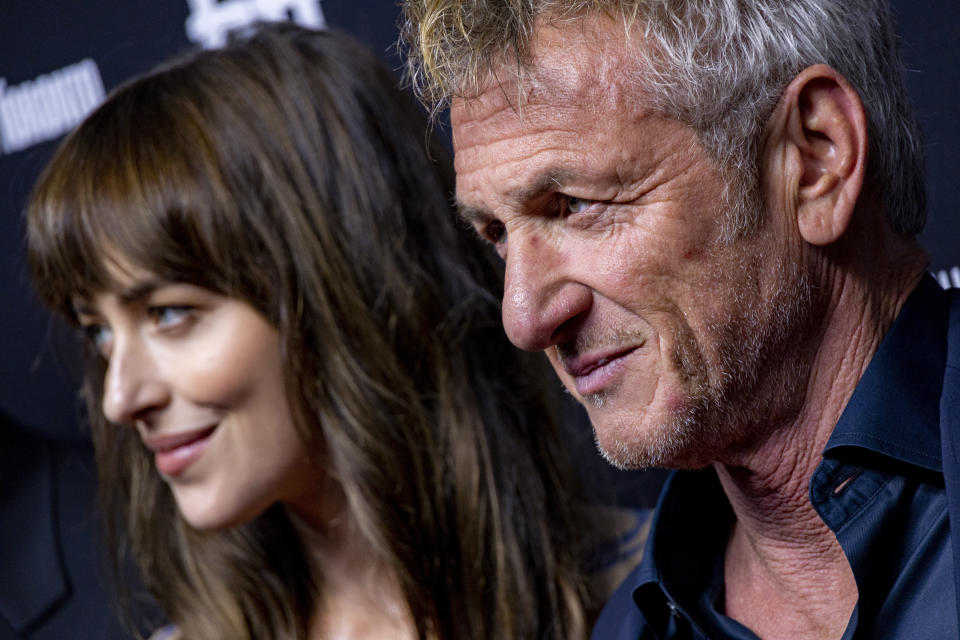 Dakota Johnson, left and Sean Penn attend the premiere of "Daddio" at the TIFF Bell Lightbox during the Toronto International Film Festival, Sunday, Sept. 10, 2023, in Toronto. (Photo by Joel C Ryan/Invision/AP)