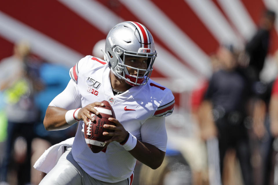 Ohio State quarterback Justin Fields (1) looks to throw during the first half of an NCAA college football game against Indiana, Saturday, Sept. 14, 2019, in Bloomington, Ind. (AP Photo/Darron Cummings)