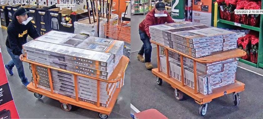 In this image filed in U.S. District Court, Providence, two Guatemalan men clench folded documents in their mouths, giving an appearance that they had paid for flooring that they wheeled out of a Pennsylvania Home Depot in December, according to a federal agent.