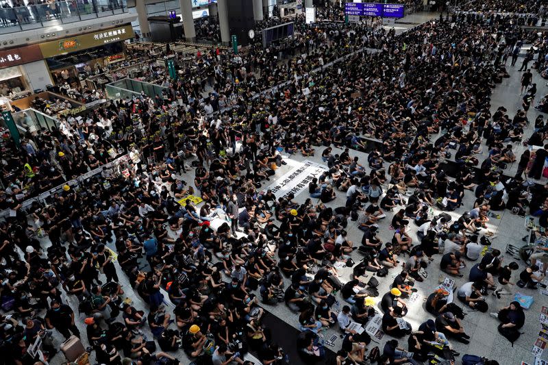 Pictures of the Year: Hong Kong protest tide turns into sea of flames