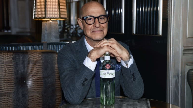 Stanley Tucci with a bottle of Tanqueray No. 10