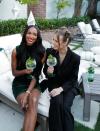 <p>Models Jasmine Tookes and Josephine Skriver get in the holiday spirit with Tanqueray in L.A. on Sunday.</p>