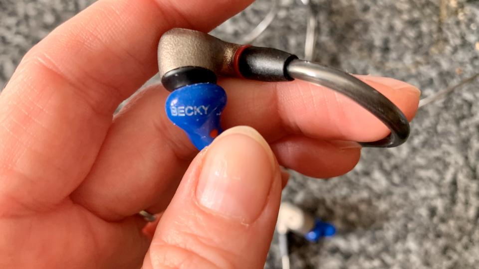 Sennheiser Custom Fit ear tip held in a hand, mounted on an IE 600 earbud