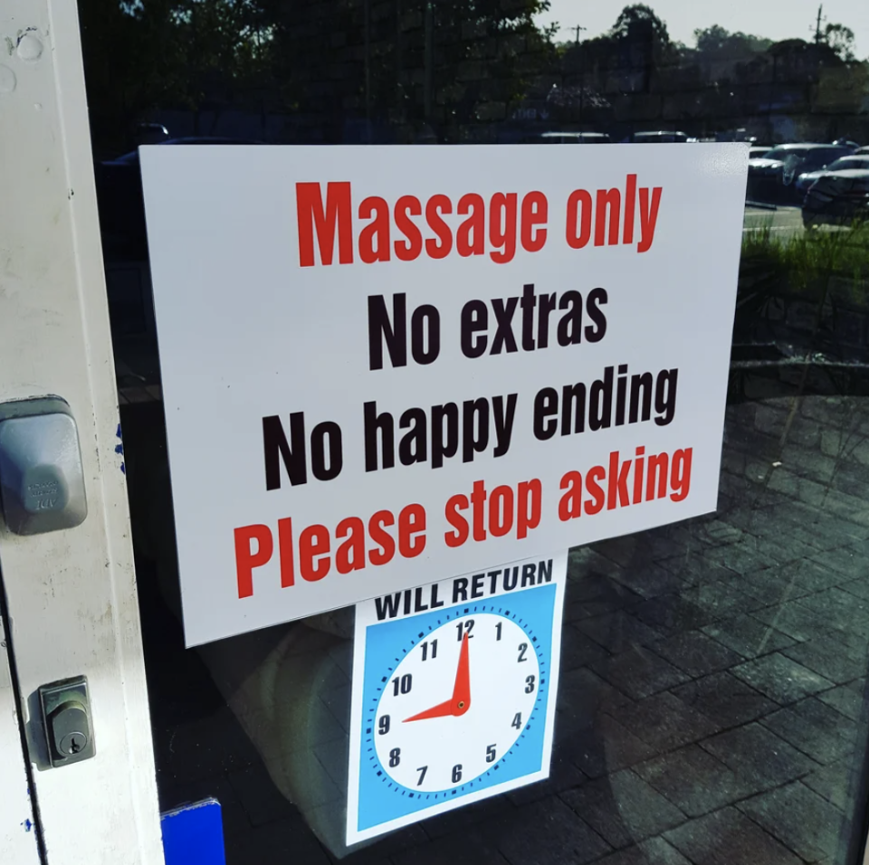 A sign says "massage only, no extras, no happy ending, please stop asking"