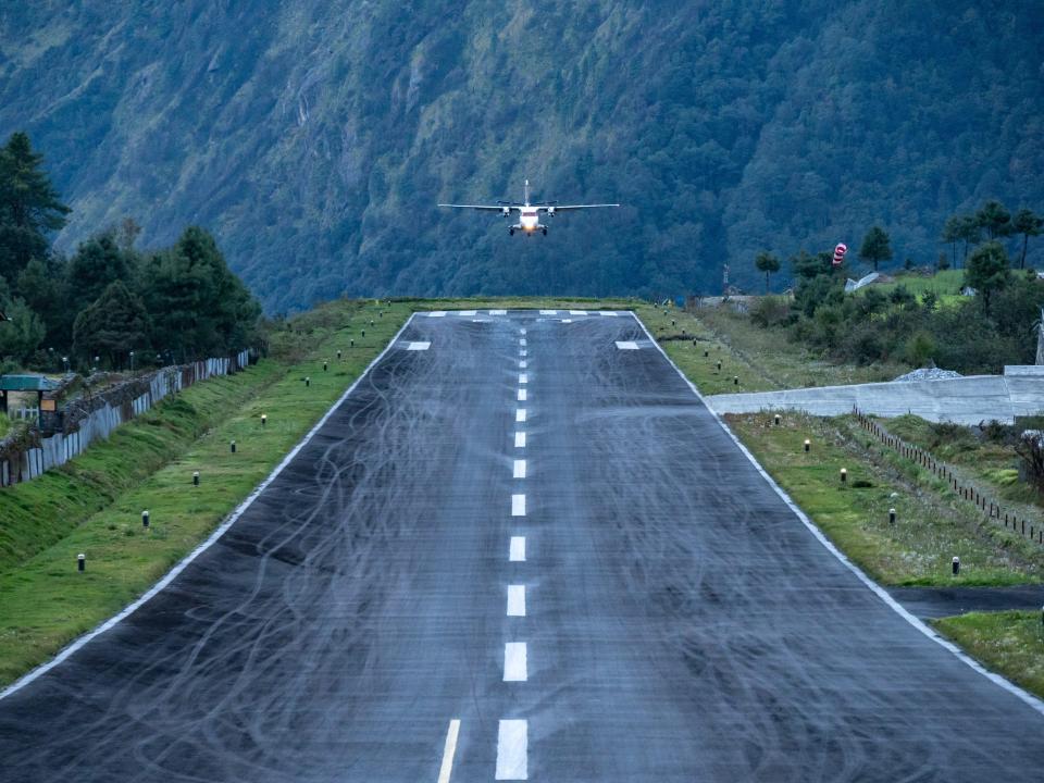 An aircraft landing at Lukla Airport in Nepal.