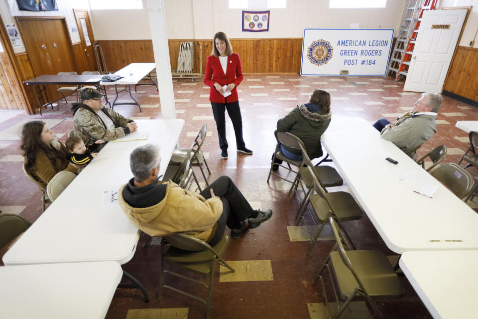 In this Nov. 11, 2019, photo, U.S. Rep. Cindy Axne, D-Iowa, speaks to local residents at the American Legion Post 184 in Winterset, Iowa. Axne defeated a Republican incumbent in 2018 even as she lost 15 of her district's 16 counties. Axne won by offsetting her losses in rural counties with an overwhelming victory in urban Polk County. (AP Photo/Charlie Neibergall)