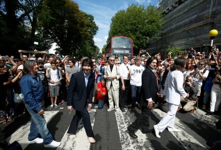Beatles Abbey Road crossing: On the 50th anniversary of the photo, here are  the 'hidden messages' on the famous album cover, London Evening Standard