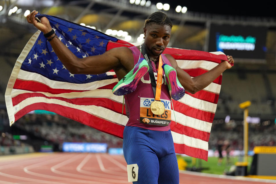 Aug 25, 2023; Budapest, Hungary; Noah Lyles (USA) poses for photographs after winning the mens 200m race during the 2023 World Athletics Championships at National Athletics Centre. Mandatory Credit: Kirby Lee-USA TODAY Sports