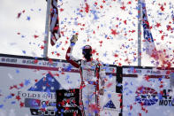 Ryan Blaney celebrates his win after a NASCAR Cup Series auto race at Atlanta Motor Speedway on Sunday, March 21, 2021, in Hampton, Ga. (AP Photo/Brynn Anderson)