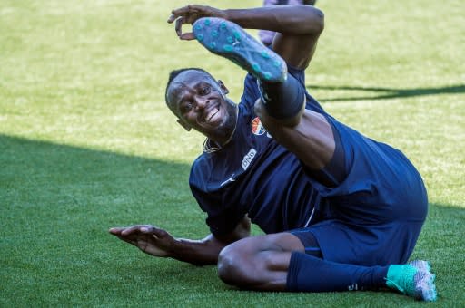 Usain Bolt said he is training at Norwegian football club Stromsgodset 'to try to get fit for the charity game in Manchester next weekend.'