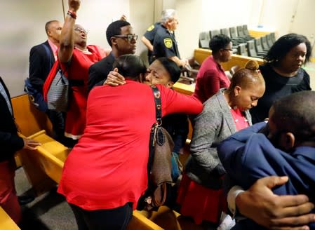 Members of Botham Jean’s family rejoice in the courtroom after former Dallas police officer Amber Guyger was found guilty in Dallas