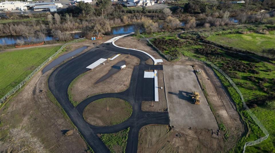 The first-ever boat ramp in Tuolumne River Regional Park is under construction in Modesto, Calif.,Thursday, Jan. 4, 2024.