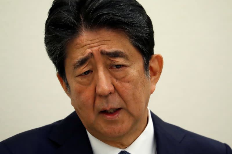 Former Japanese PM Shinzo Abe holds a news conference in Tokyo