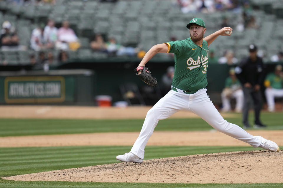 Oakland Athletics pitcher Jack O'Loughlin throws to a Toronto Blue Jays batter during the sixth inning of a baseball game Saturday, June 8, 2024, in Oakland, Calif. (AP Photo/Godofredo A. Vásquez)