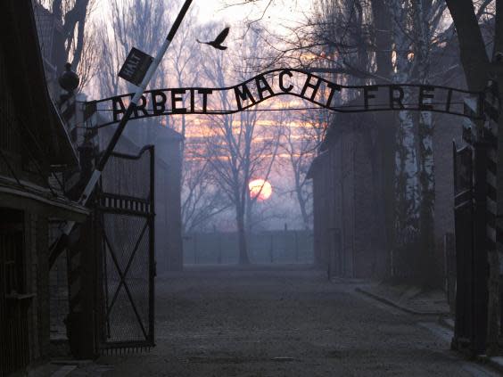 The gates of Auschwitz concentration camp in Poland where more than 1m people died during the Holocaust (AFP)