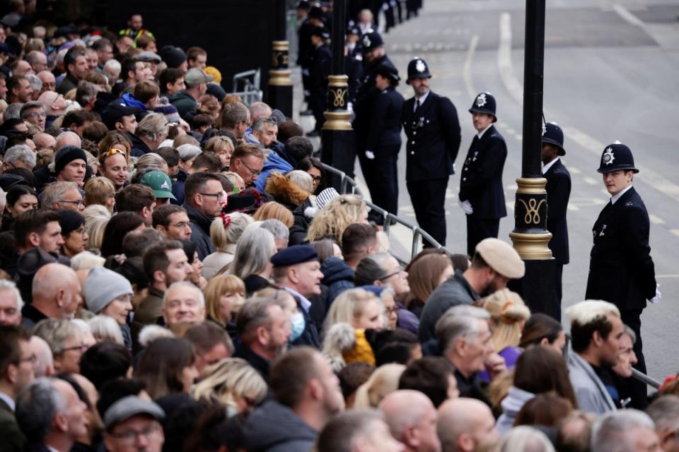 Police officers stand guard on the day of the state funeral and burial of Britain’s Queen Elizabeth (REUTERS)