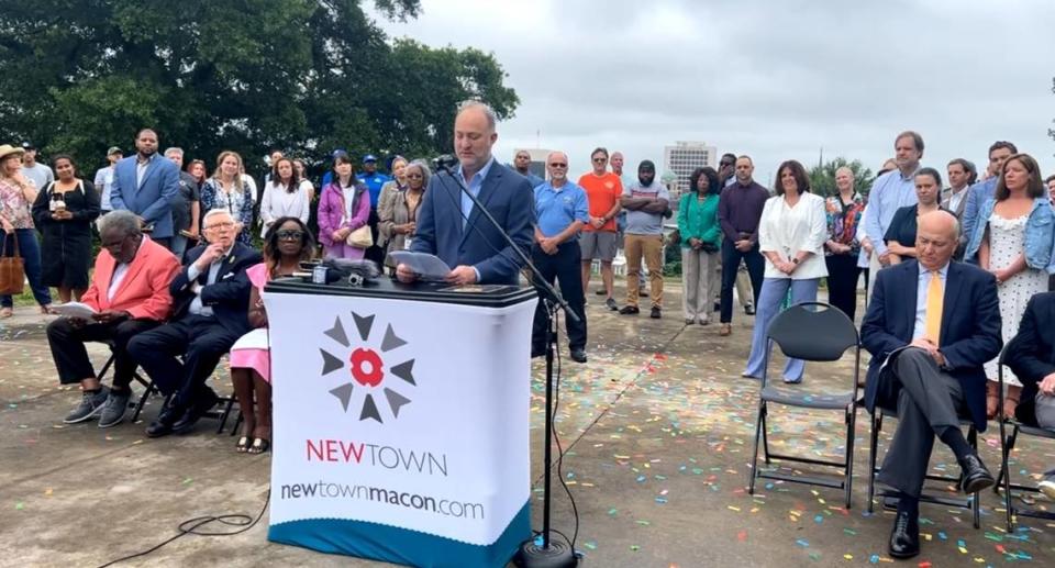 Mayor Lester Miller addresses the crowd at a press conference Friday to announce NewTown Macon had been honored with the 2024 Great American Main Street Award.