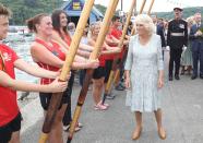 <p>The Duchess of Cornwall wore a blue-and-white floral dress with a pearl necklace and tan heels while attending the Fowey Festival Celebration during day one of their visit to Devon and Cornwall.</p>