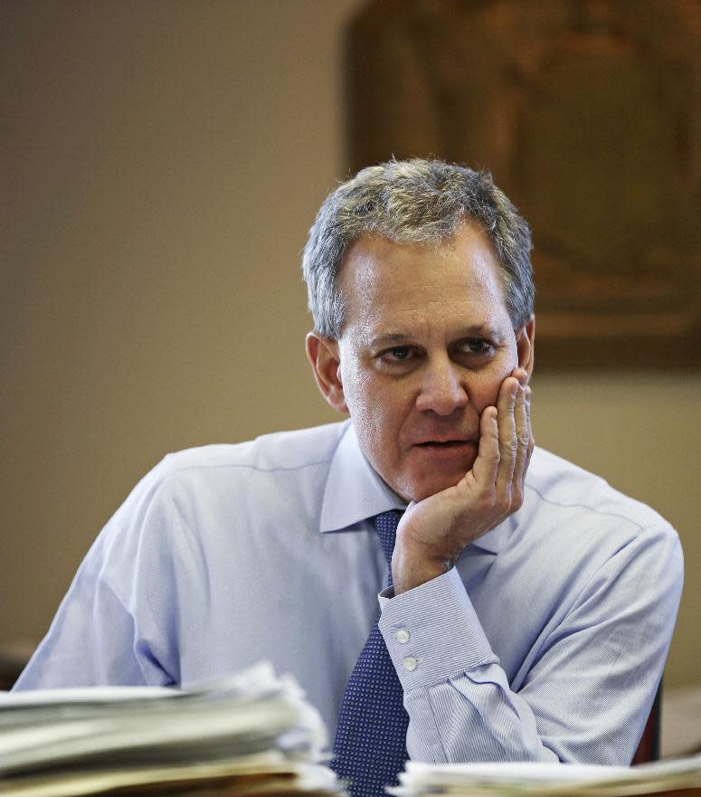 FILE - In this Feb. 17, 2017, file photo, New York State Attorney General Eric Schneiderman speaks to colleagues at his office in New York. Schneiderman, already a champion of New York's liberal elite, is emerging as a major player in the broader Trump resistance. Backed by one of the nation's largest public law firms and a years-long familiarity with the new president, he may be positioned to challenge Trump's agenda in ways his Democratic allies in Washington cannot. (AP Photo/Frank Franklin II, File)