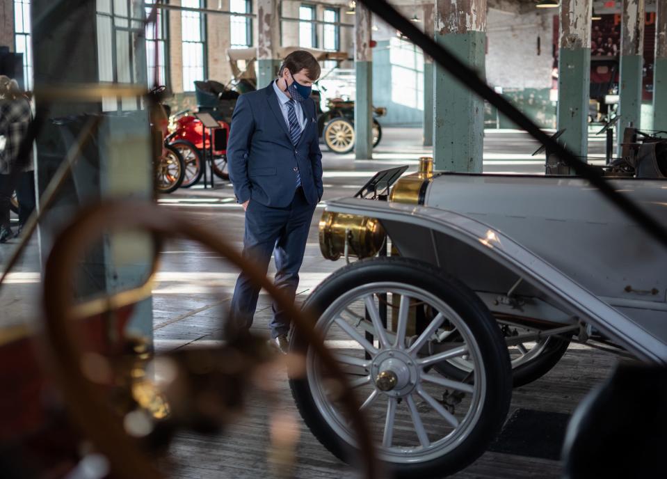 Ford Motor Co. CEO Jim Farley looks over vehicles on display at the Ford Piquette Avenue Plant in Detroit on Jan. 14, 2021. Farley's grandfather, Emmet E. Tracy, helped to build the Ford Model T on the Ford assembly lines at the Rouge River Plant beginning in 1914 when he was just 13 years old.