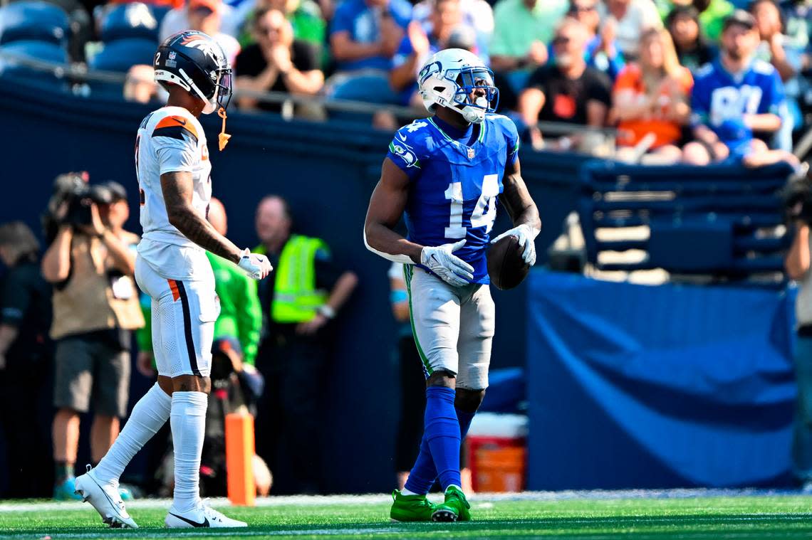 Seattle Seahawks wide receiver DK Metcalf (14) walks off after a completion during the fourth quarter of the game against the Denver Broncos at Lumen Field, on Sunday, Sept. 8, 2024, in Seattle, Wash.