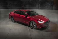 <p>With mid-size sedan sales slowing industry-wide as customers flock to crossovers and SUVs, Hyundai bets big on the Sonata's styling once again. <a href="https://www.caranddriver.com/reviews/a26952218/2020-hyundai-sonata-design-prototype-drive/" rel="nofollow noopener" target="_blank" data-ylk="slk:The 2020 Sonata;elm:context_link;itc:0;sec:content-canvas" class="link ">The 2020 Sonata</a>, which goes on sale in the fall of 2019, goes even more daring than did the knockout sixth-generation model. Although Hyundai promises Sonata prices won't rise much, <a href="https://www.caranddriver.com/news/g26960657/hyundai-sonata-new-features-2020/" rel="nofollow noopener" target="_blank" data-ylk="slk:there is a host of new features;elm:context_link;itc:0;sec:content-canvas" class="link ">there is a host of new features</a>, including sweet LED running lamps that blend into the hood. This Sonata is the first Hyundai in which owners can use a smartphone to lock, unlock, and start the car. There also is a full roster of driver-assistance and safety features, and the Sonata can even be pulled into or out of a tight parking spot via remote control.</p>