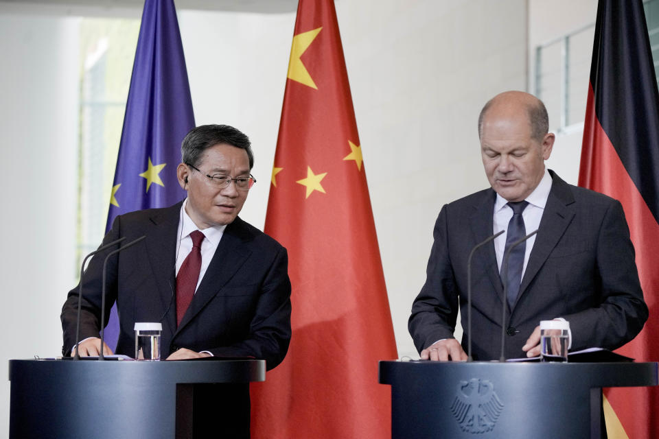 German Chancellor Olaf Scholz, right, and Chinese Premier Li Qiang, brief the media following government consultations of the both countries at the chancellery in Berlin, Germany, Tuesday, June 20, 2023.(AP Photo/Markus Schreiber)