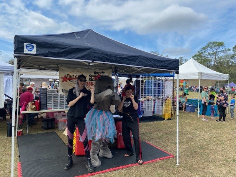 Millie, the Manatee's Festival mascot, during the Orange City Blue Springs Manatee Festival in 2023.