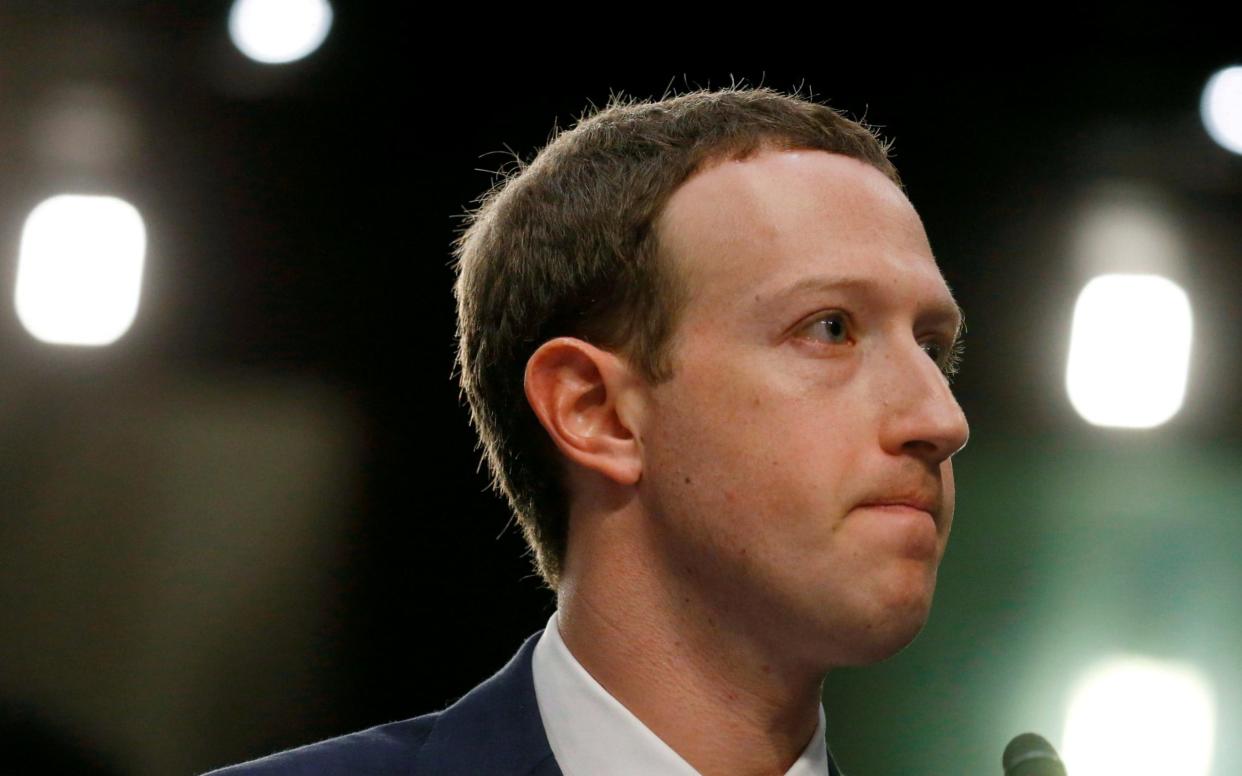 Mark Zuckerberg is facing calls to step down as chair of his company as well as a new lawsuit from US advertisers - REUTERS