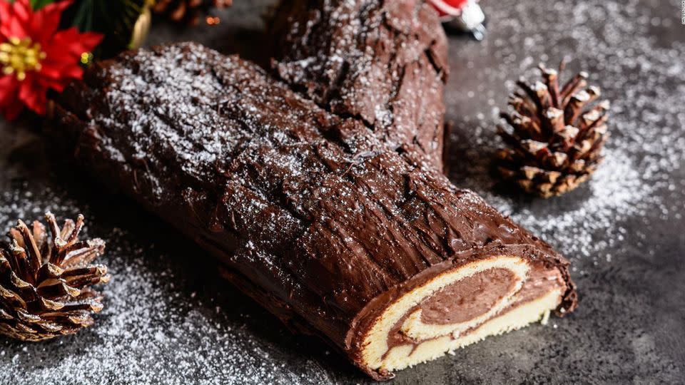 In France, a bûche de Noël makes for a sweet end to a lavish holiday meal. - Shutterstock