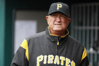FILE - In this March 31, 2019, file photo, Pittsburgh Pirates manager Clint Hurdle walks through the dugout in the third inning of a baseball game against the Cincinnati Reds in Cincinnati. Hurdle hopes to return for what would be his 10th season as the Pirates’ manager in 2020. He has two more years remaining on a deal that started with the 2018 season. (AP Photo/John Minchillo, File)