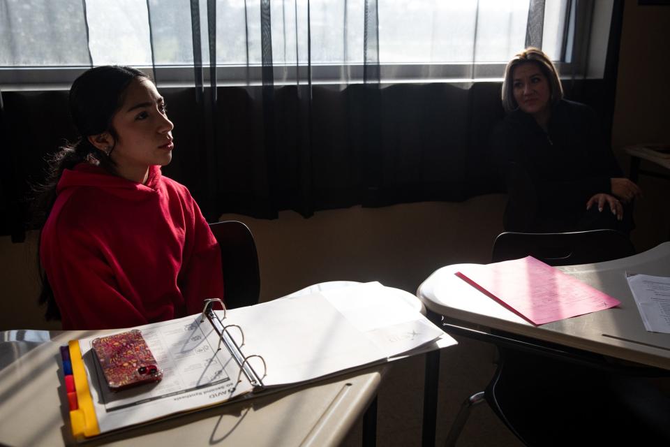 Freshman Leilah Munoz listens to a tutorial from AVID early college facilitator Lesley Salinas during a voluntary half-day at H.M. King Early College High School on Friday, Feb. 9, 2024, in Kingsville, Texas.
