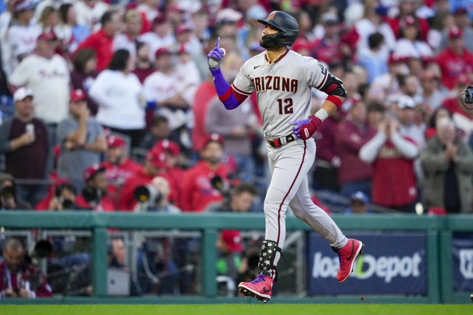 Arizona Diamondbacks' Lourdes Gurriel Jr. celebrates after a home run off Philadelphia Phillies starting pitcher Aaron Nola during the second inning in Game 6 of the baseball NL Championship Series in Philadelphia Monday, Oct. 23, 2023. (AP Photo/Matt Slocum)