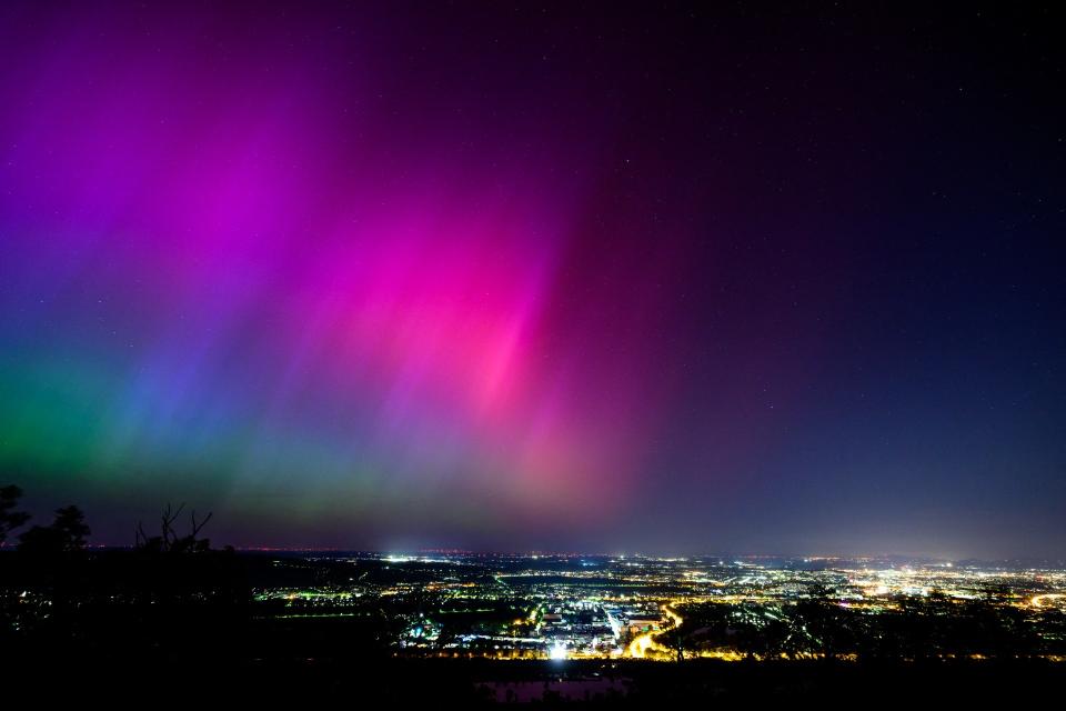 Northern lights or aurora borealis illuminate the night sky over Vienna during a geomagnetic storm on May 11, 2024.