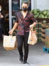 <p>John Legend picks up some groceries on Monday in Los Angeles.</p>