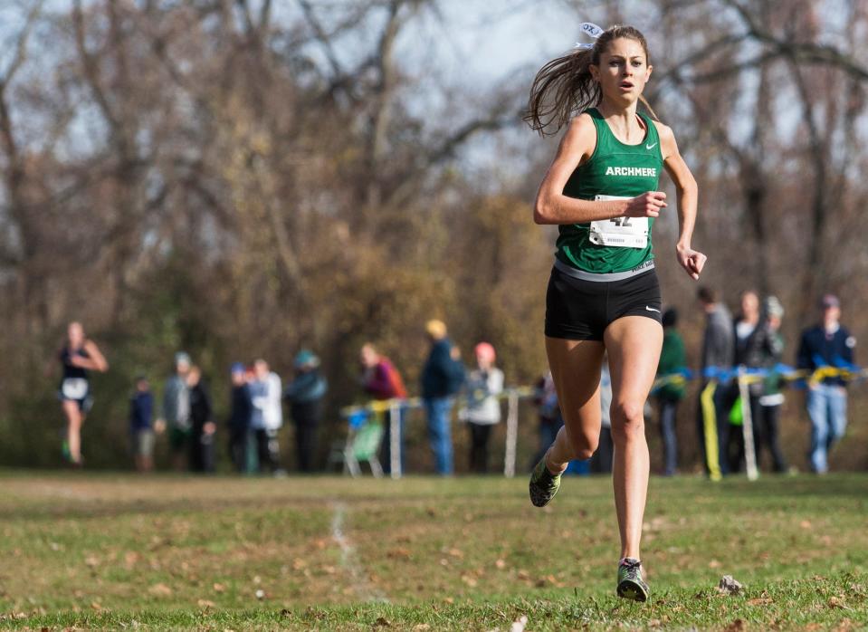 Archmere's Colleen Carney races to the finish line in the DIAA Division II Girls Cross Country State Championship at White Clay Creek State Park on Saturday afternoon, November 8, 2014. Carney won with a time of 19:18.12.