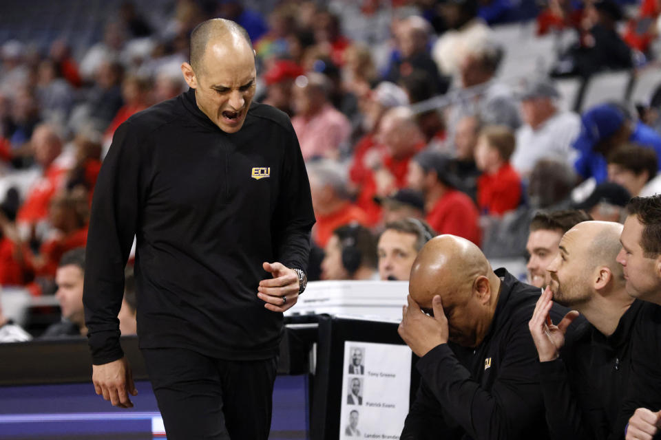 East Carolina head coach Michael Schwartz reacts as East Carolina plays Houston during the second half of an NCAA college basketball game in the quarterfinals of the American Athletic Conference Tournament, Friday, March 10, 2023, in Fort Worth, Texas. Houston won 60-46. (AP Photo/Ron Jenkins)